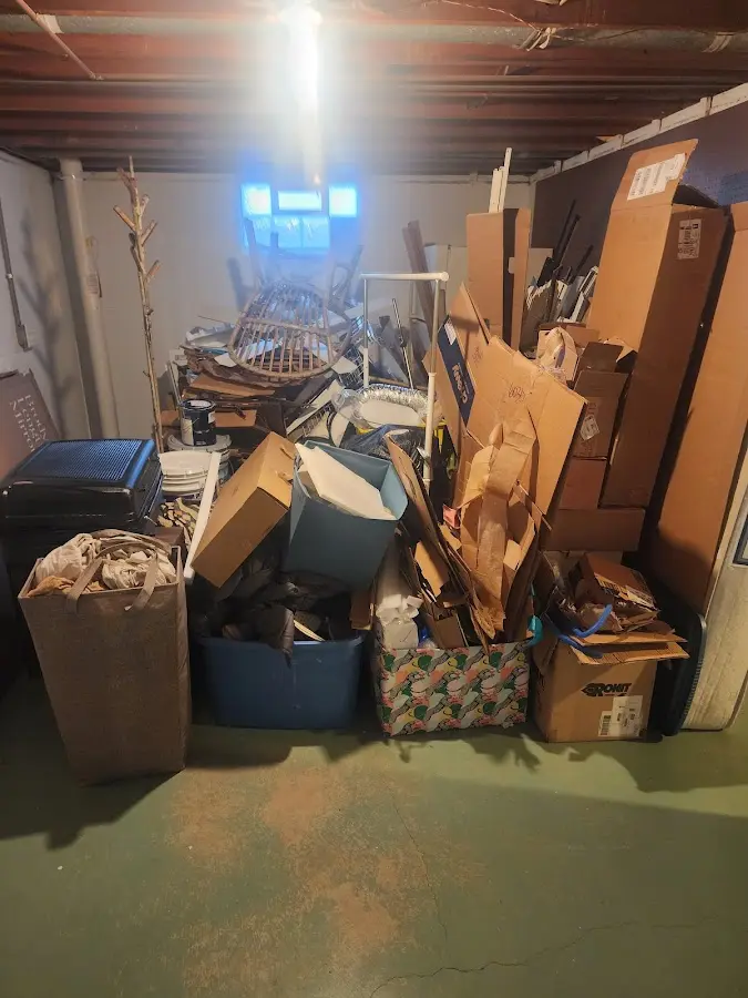 Roll-off dumpster container at job site for Yard Waste Dumpster Rental in Grattan